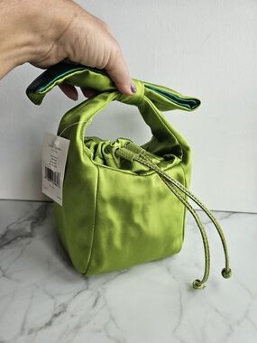 From the tag in your photo, this looks like a kate spade new york Small Babette